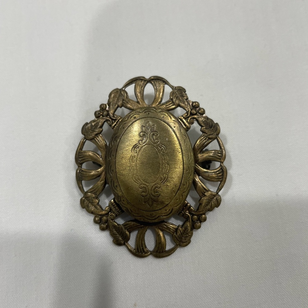 Locket style brooch